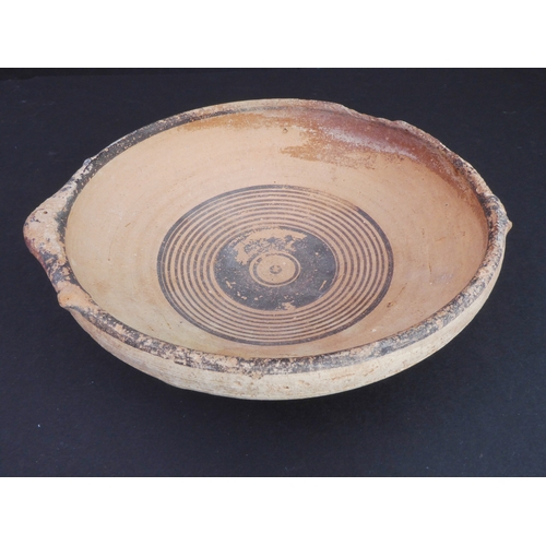 226 - A circa 1500 BC terracotta bowl, possibly Greek-Cypriot: central interior decorated with concentric ... 