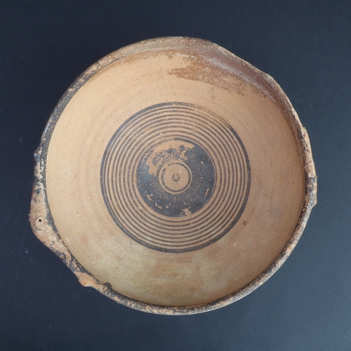 226 - A circa 1500 BC terracotta bowl, possibly Greek-Cypriot: central interior decorated with concentric ... 