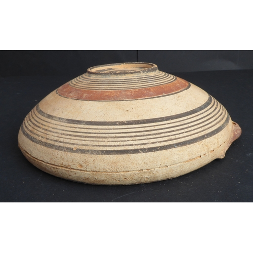 226 - A circa 1500 BC terracotta bowl, possibly Greek-Cypriot: central interior decorated with concentric ... 