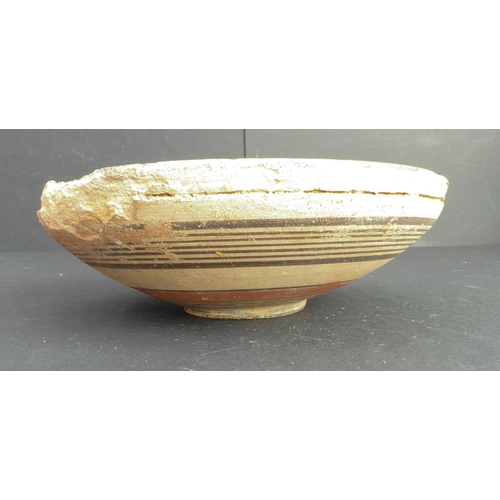 226 - A circa 1500 BC terracotta bowl, possibly Greek-Cypriot: central interior decorated with concentric ... 