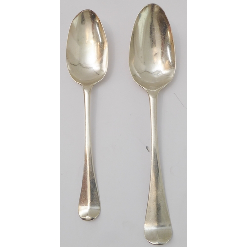 122 - Two similar mid-18th century hallmarked silver tablespoons, one with engraved lettering, London assa... 