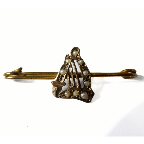 159 - A sapphire and diamond-set oval cluster ring, the tapering shank stamped 'PLAT 18CT', ring size Q (2... 