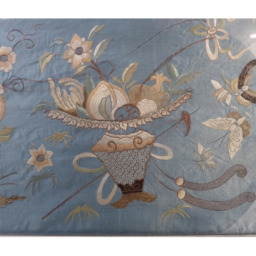 227 - A pair of silver framed and glazed (later) Chinese embroideries on silk: each depicting a central ur... 