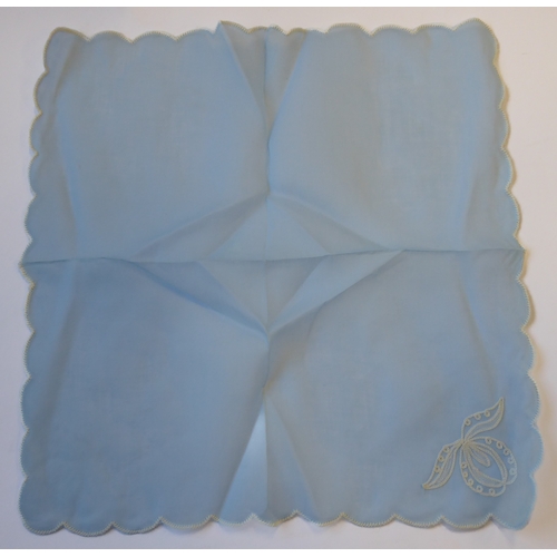 239 - A powder-blue embroidered chiffon-effect tablecloth and 12 matching napkins (tablecloth 267cm x 166c... 