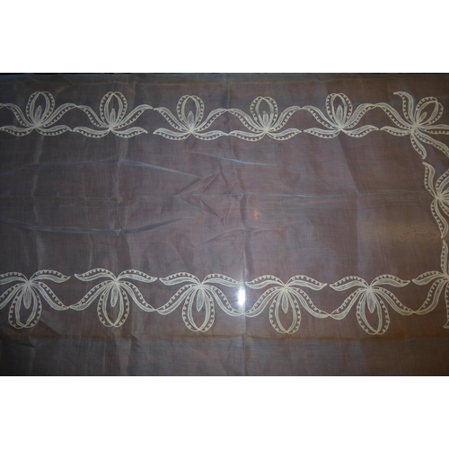 239 - A powder-blue embroidered chiffon-effect tablecloth and 12 matching napkins (tablecloth 267cm x 166c... 