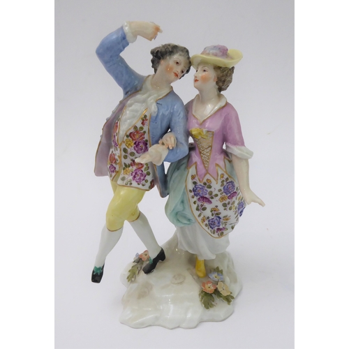 18 - Two similar 19th century hand-decorated German porcelain models of dancers; impressed marks and blue... 