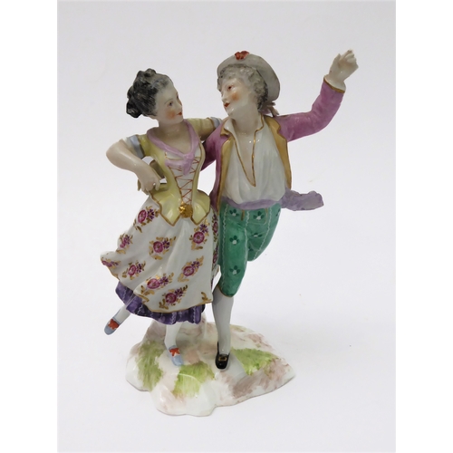 18 - Two similar 19th century hand-decorated German porcelain models of dancers; impressed marks and blue... 