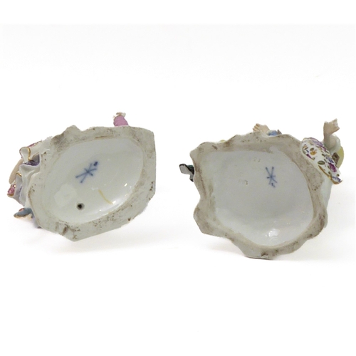 18 - Two similar 19th century hand-decorated German porcelain models of dancers; impressed marks and blue... 