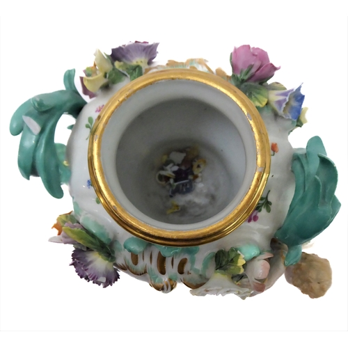 23 - A 19th century hand-decorated German porcelain potpourri: the reticulated dome-topped gilt highlight... 