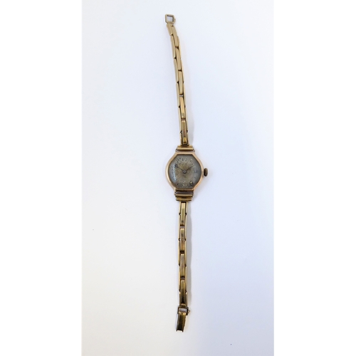 285 - A lady's Art Deco period yellow gold cased wristwatch: the degraded dial with Roman numerals, gold-p... 