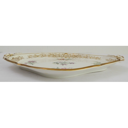 30 - A 19th century two-handled, lozenge-shaped ceramic Worcester tray: the border gilt-decorated with va... 