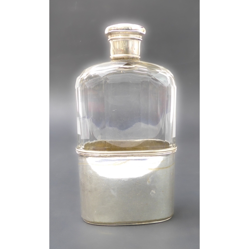 108 - A late 19th century cut-glass spirit flask: hallmarked silver mounted screw-top lid with maker's mar... 