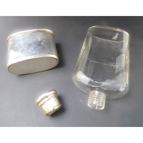 108 - A late 19th century cut-glass spirit flask: hallmarked silver mounted screw-top lid with maker's mar... 