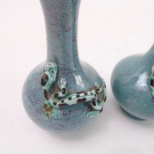 11 - An interesting pair of late 19th to early 20th century Chinese bottle vases with robin's egg glaze; ... 