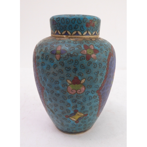 17 - A late 19th to early 20th century Japanese pottery vase and cover with internal lid: decorated in cl... 