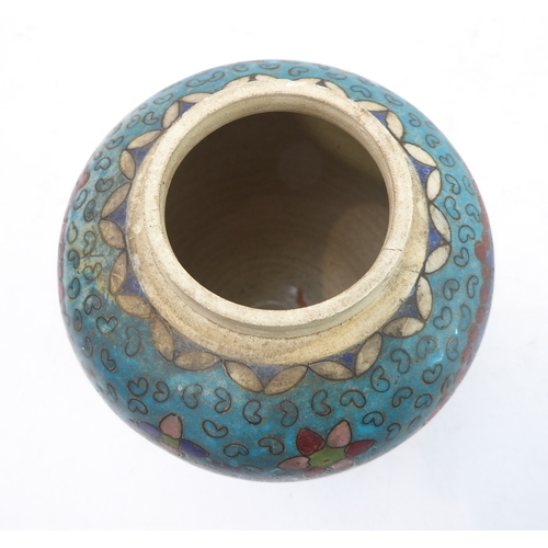 17 - A late 19th to early 20th century Japanese pottery vase and cover with internal lid: decorated in cl... 