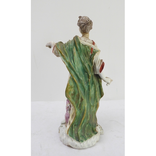 26 - A 19th century hand-decorated hard-paste porcelain figure of a maiden in long flowing floral dress (... 