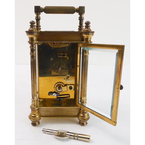 286 - An early 20th century gilt-metal and glass-sided carriage timepiece: white enamel dial with Roman nu... 