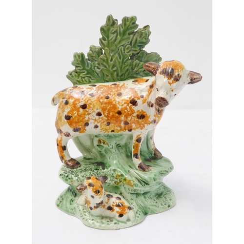 61 - An early 19th century spongeware-style bocage model of a spotted ewe and lamb (14.5 cm high)