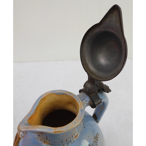 70 - A pair of Porquier-Beau Quimper faience wall-pockets and a glazed German stoneware flagon:
 1. The w... 