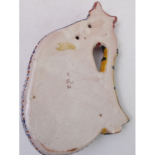 70 - A pair of Porquier-Beau Quimper faience wall-pockets and a glazed German stoneware flagon:
 1. The w... 