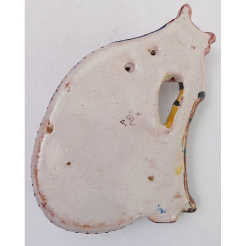70 - A pair of Porquier-Beau Quimper faience wall-pockets and a glazed German stoneware flagon:
 1. The w... 