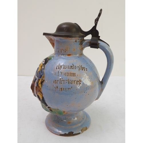70 - A pair of Porquier-Beau Quimper faience wall-pockets and a glazed German stoneware flagon:
 1. The w... 