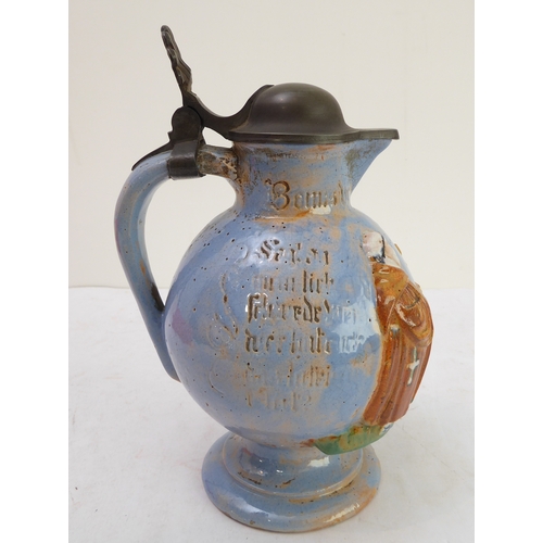 70 - A pair of Porquier-Beau Quimper faience wall-pockets and a glazed German stoneware flagon:
 1. The w... 