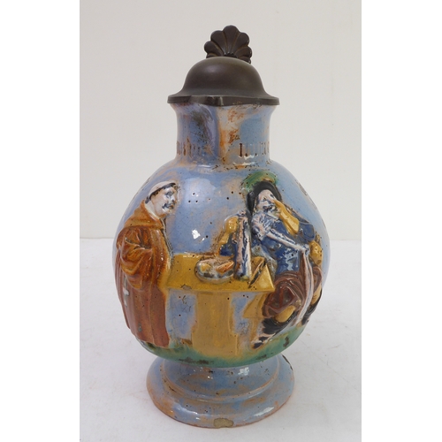 70 - A pair of Porquier-Beau Quimper faience wall-pockets and a glazed German stoneware flagon:
 1. The w... 