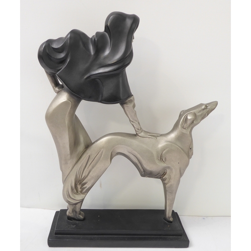 74 - Two Austin Production Inc. ceramic sculptural female figures:
 An Art Deco lady with Borzoi dog on r... 