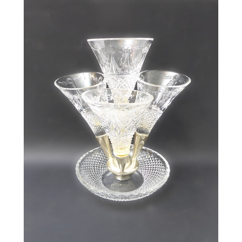 98 - A 20th century lead crystal four-branch epergne. The four hobnail and floral wheel cut glass branche... 