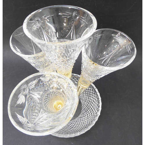 98 - A 20th century lead crystal four-branch epergne. The four hobnail and floral wheel cut glass branche... 