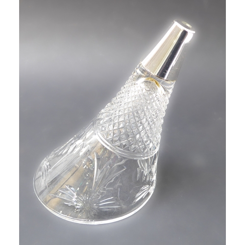 98 - A 20th century lead crystal four-branch epergne. The four hobnail and floral wheel cut glass branche... 