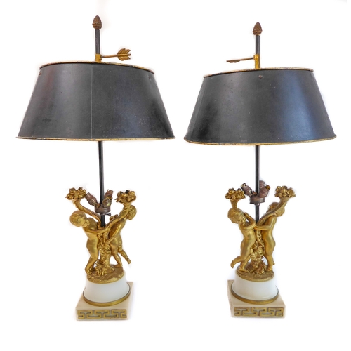 114 - A pair of fine 19th century ormolu table lamps: each modelled as two cherubic-style figures with cor... 