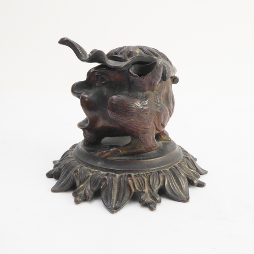 120 - A late 19th century bronze therianthrope inkwell in the form of a biped with human head and canine l... 
