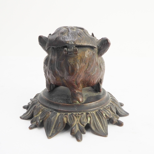 120 - A late 19th century bronze therianthrope inkwell in the form of a biped with human head and canine l... 