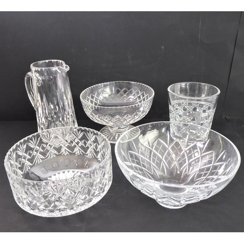 102 - Five pieces of cut glassware:
 three bowls (one with 'nibbles' to rim);
 a tall and elegant hand-cut... 