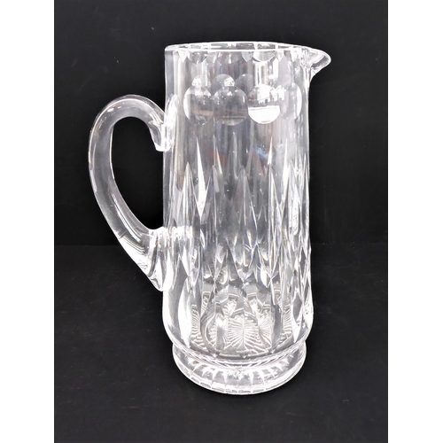 102 - Five pieces of cut glassware:
 three bowls (one with 'nibbles' to rim);
 a tall and elegant hand-cut... 