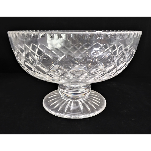 102 - Five pieces of cut glassware:
 three bowls (one with 'nibbles' to rim);
 a tall and elegant hand-cut... 