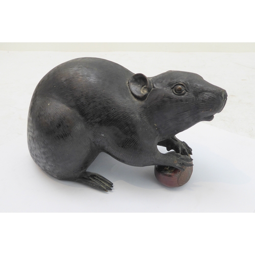 119 - In the style of Muroe Kichibei, a Japanese Meiji period patinated bronze realistic sculpture of a ra... 