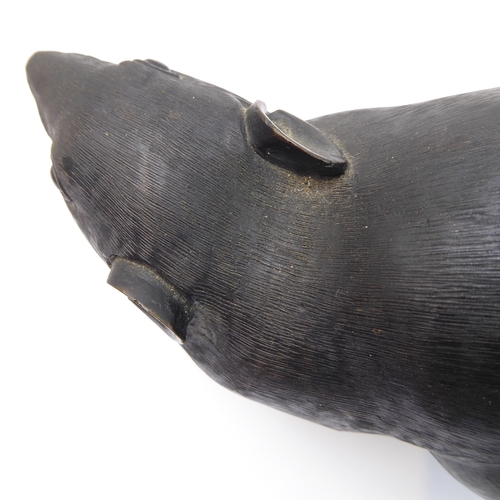 119 - In the style of Muroe Kichibei, a Japanese Meiji period patinated bronze realistic sculpture of a ra... 