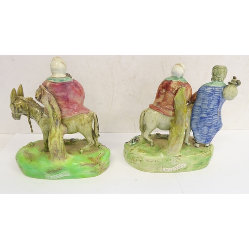 53 - A pair of early 19th century Walton Staffordshire lead glazed earthenware religious figures, 
