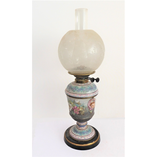 103 - A late 19th century ceramic oil lamp: spherical, etched clear-glass shade; the circular tapering bod... 