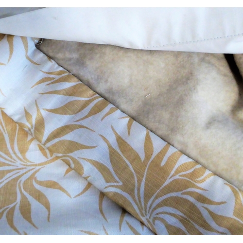 405 - A pair of curtains in a heavy cream linen-effect fabric with gold leaf pattern; triple pinch pleat h... 