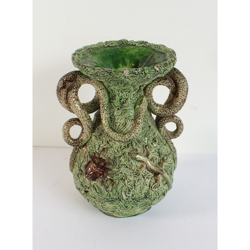 16 - A Bernard Pallisy style two-handled vase decorated with serpents, two lizards and beetles, impressed... 