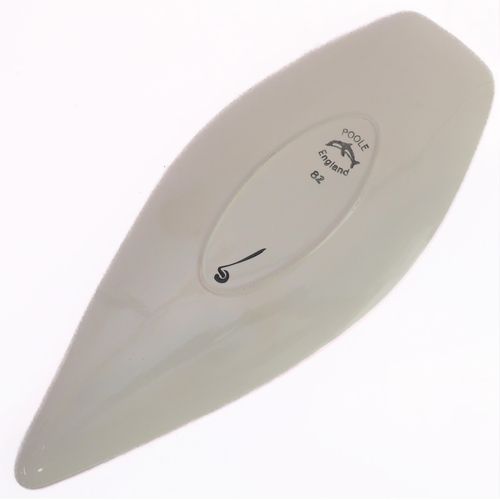 24 - Two pieces:
 1. a Poole Pottery 'Delphis' boat-shaped studioware dish with 'Poole - England - 82' pa... 