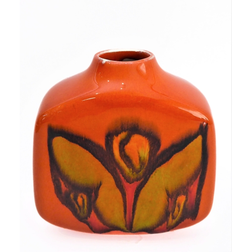 24 - Two pieces:
 1. a Poole Pottery 'Delphis' boat-shaped studioware dish with 'Poole - England - 82' pa... 