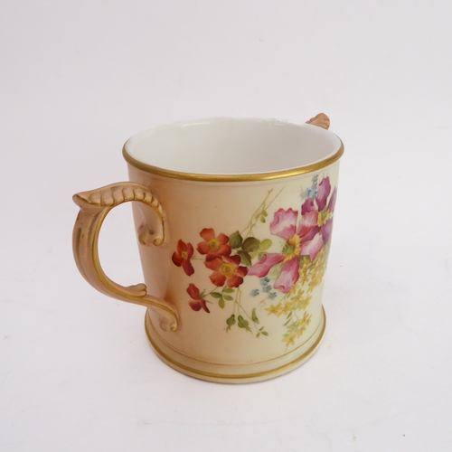 32 - An early 20th century Royal Worcester blush porcelain loving cup: two-handled and hand-decorated in ... 