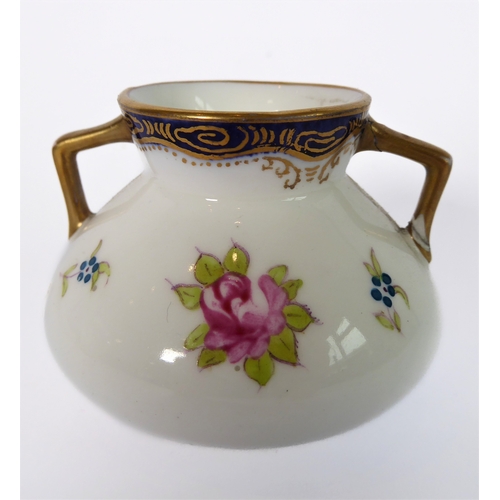 35 - Two pieces of hand-decorated porcelain:
 1. an early 20th century Hadley's (Worcester, England) porc... 