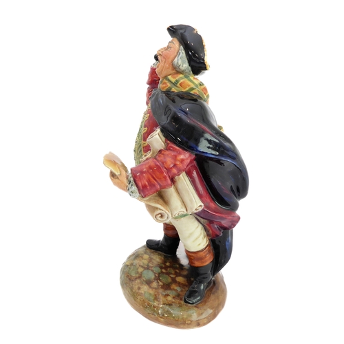 38 - A circa 1952 Royal Doulton figure, 'Town Crier' (HN 2119). (21.5 cm high). 
 (Restored)
